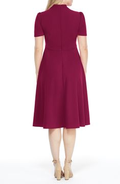 This dainty short sleeve dress is a retro inspired staple that's perfect for any well-dressed occasion. 45" length Necktie Short sleeves Back zip closure Lined 96% polyester, 4% spandex Hand wash, dry flat Imported Model Stats: 5'10" height; 34" bust; 27" waist; 35" hips. Classic Short Sleeve Party Dress, Elegant Short Sleeve Midi Dress With Back Zipper, Party Dresses With Flattering Silhouette And Short Sleeves, Fitted Midi Dress With Short Sleeves For Semi-formal, Fitted Midi Dress With Short Sleeves For Semi-formal Occasions, Short Sleeve Semi-formal Summer Midi Dress, Summer Semi-formal Short Sleeve Midi Dress, Semi-formal Short Sleeve Summer Midi Dress, Fitted Midi Dress With Flattering Silhouette And Short Sleeves