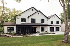 a large white house with lots of windows