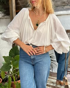 Inspired by the breezy blouse styles of the '70s, the Luna shirt features a free-flowing cut and a scoop neck.  The generous fit allows you to feel the freedom of unrestricted movement.   It moves beautifully and drapes perfectly. Its long, full-length sleeves taper at the wrist, ending in a big ruffle.  Easy to layer, the Luna shirt is an instant classic you'll reach for again as one season gives way to another.  Feminine, airy and super bohemian at the same time. THE FABRIC  The fabric of this blouse is raw and unbleached cotton. It's natural and soft against the skin. Unlike many other fabrics, this gauze is untreated and therefore totally natural. It may contain unseparated husk parts and it's woven in the natural color of the raw cotton staple. MEASUREMENTS This is a custom made blous Bohemian Blouse, Hippie Blouse, Blouse Cotton, Hippy Chic, Womens Blouses, Bohemian Blouses, Mode Inspo, Blouse Outfit, Cotton Blouse