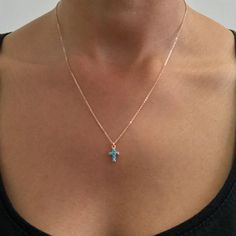 "This precious necklace is composed of genuine AAA quality natural real Turquoise gemstones and 14K solid gold. This darling pendant is complemented by a matching 14K solid gold adjustable chain. This design is also available to be purchased as a charm alone without the chain. ♦ Turquoise Cross Dimensions: approximately 7mm (w) x 12mm (h) ♦ Metal Finish: High Shine Polish ♦ This design is available in Rose, White and Yellow 14K Gold ♦ Please note that this item takes about 3 to 5 business days f Turquoise Cross Necklace, Solid Gold Charms, Rose Gold Charms, Turquoise Cross, Real Turquoise, Solid Gold Necklace, Gold Cross Necklace, Solid Gold Chains, Gold Charm Necklace