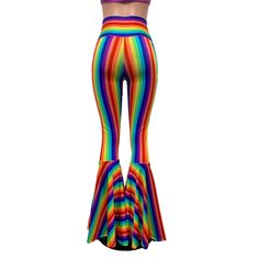 "**Due to SO MANY issues with USPS - we STRONGLY ENCOURAGE you to purchase the UPS Upgrade with your order located here: https://www.etsy.com/listing/926751536/ups-upgrade Funky and bold spandex high waisted bell bottoms in rainbow stripe with purple sparkle lace-up ties. These bell bottoms will fit you perfectly. They hug your hips and flare out at the feet. The standard inseam is 35\" (the mannequin is 5'8\") but can be customized by putting your desired inseam in the comments/notes when check Multicolor Full Length Pants, Fitted Multicolor Wide Leg Pants, Fitted Wide Leg Multicolor Pants, Retro Flare Fitted Bottoms, Retro High Waist Stretch Flares, Fitted Multicolor High-waisted Wide Leg Pants, Fitted Multicolor Wide Leg Bottoms, Retro Stretch Wide Leg Full-length Pants, Multicolor Party Trousers