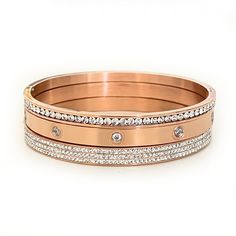 Stainless steel stacking bracelets coated in 18k Gold, Rose Gold, and Sterling Silver Size: Runs small and fits up to a 6.75" wrist See Size Chart to quickly measure your wrist using a standard Apple Watch Band Trendy Rose Gold Stackable Jewelry, Stackable Stainless Steel Bracelet Jewelry, Stackable Stainless Steel Bracelet, Everyday Rose Gold Stainless Steel Jewelry, Rose Gold Metal Bangle For Everyday Wear, Rose Gold Metal Bangle, Stackable Rose Gold Bracelets As Gift, Stackable Rose Gold Bracelets For Gift, Rose Gold Stackable Bracelets As Gift