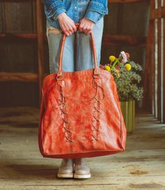 Headed home for the holidays?  Have a creative career which requires lugging materials or samples?  We have the bag for you.  REBEKAH is a giant tote bag with a very roomy interior for all the things to bring in one trip.  REBEKAH is cotton lined with one zipper pocket, and two small slip pockets, also has a key fob attached.  A zip top closure will keep contents secure, padded shoulder straps keep this giant bag from being painful and an outer zipper pocket is convenient for phone or sunglasses Tote Shoulder Bag With Luggage Sleeve For Errands, Large Capacity Tote Duffle Bag For Shopping, Shopping Tote Weekender Bag With Leather Handles, Weekender Tote Bag With Leather Handles For Shopping, Rectangular Weekender Bag For Travel, Leather Handles Tote Travel Bag For Shopping, Rectangular Weekender Bag With Rolled Handles For Travel, Shopping Tote Duffle Bag, Rectangular Duffle Bag With Leather Handles For Shopping