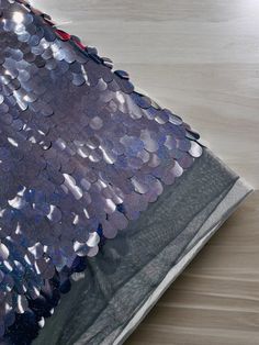 Jumbo Oval Paillette Sequins  The high-quality mesh of the Oval Iridescent Sequins Fabric features jumbo... Vinyl Fabric