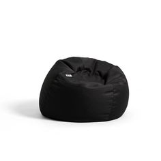 a black bean bag chair sitting on top of a white floor