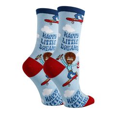 You'll be living out Happy Little Dreams with these fuzzy Bob Ross socks! Brand new for 2022 - grab a pair of these cute, blue Bob Ross socks as he skates and paints with his fro and beard made from extra fuzzy yarn. The perfect gift for anyone who loves to dream or paint with Bob. This pair of mid-calf crew length novelty socks come in one size that fits most women's feet. Made of 65% Combed Cotton, 32% Nylon, 3% Spandex. We have the same design also available in a larger men's size which you c Funny Blue Socks For Gift, Sock Store, Blue Bob, Bob Ross, Novelty Socks, Sock Shoes, Crew Socks, Combed Cotton, Mid Calf