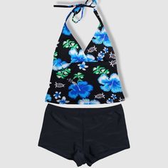 Two piece tying halter tankini top set - black with blue hibiscus, green leaves, and white turtles and fish pattern with black shorts. Padding inserts included. Made of 80% nylon and 20% spandex. Lining is 100% nylon. Designed and shipped from Hawaii and made in Vietnam. Colors may vary from picture depending on cut of fabric. Tropical Stretch Tankini With Halter Neck, Tropical Stretch Halter Neck Tankini, Tropical Halter Neck Stretch Tankini, Blue Tropical Stretch Tankini, Blue Stretch Tropical Tankini, Fitted Halter Neck Tropical Tankini, Black Tropical Print Tankini For Summer, Fitted Tropical Print Halter Neck Tankini, Hawaiian Style Sleeveless Tankini For Swimming