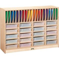 a wooden storage unit with plastic bins and dividers on the bottom, filled with colored pencils