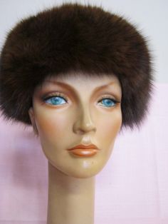 A beautifully made vintage hat, trimmed around the brim with fur (I think it is rabbit, but I am not sure) and the top part is a combination of snakeskin and brown suede.   Exceptional design. Quilted  brown satin lining. No labels. In  very good used vintage condition inside and out. Women size medium ( 22 inches circumference). SALE: $30.00  Originally: $35.00 Please email your question/s BEFORE purchasing.  I do not accept returns or make exchanges. Thank you very much for viewing. Beautifully Made, Brown Satin, Vintage Fur, Vintage Hat, Hats Vintage, Brown Suede, Snake Skin, Caps Hats, Accessories Hats