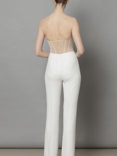 Perfect for any bridal occasion, these high rise, fitted and flared bootleg "Marie" trousers in ivory crepe are a classic pant staple, lined in silk satin and fastened with an invisible zip at the back. Elegant Flared Bottoms For Wedding, Elegant Fitted Flare Pants, Elegant Fitted Pants For Gala, White Flared Formal Bottoms, Cream Evening Trousers, Chic Cream Pants For Evening, Elegant Fitted Evening Pants, Elegant Evening Pantsuit With Trousers, Elegant High-waisted Wedding Pants