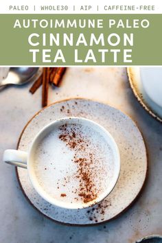 a cup of coffee with cinnamon on top and the words autoimmune paleo tea