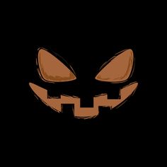 an orange pumpkin face on a black background