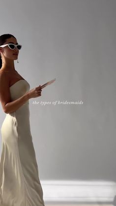 a woman in a white dress and sunglasses is holding a paper with the words the types of bridesmaids on it