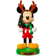 a mickey mouse figurine with a christmas tree in his hand and the name mickey on it