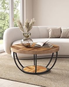 a living room with a white couch and wooden table