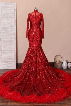 Gorgeous and distinct, this red sequin long mermaid prom gown features fitted bodice with nice illusion high neck and sheer long sleeves. The fluffy turkey feather matches the patterned sequin perfectly. You will be the shining star for sure! Red Sequin Feather Dramatic Mermaid Prom Dress. shown color red bra support with cups boning no closure back zipper lining partially lined Mermaid Prom Gown, Mermaid Gown Prom, High Neck Prom Dress, Prom Dress With Train, Bra Support, Mermaid Prom Dress, Red Bra, Turkey Feathers, Long Train