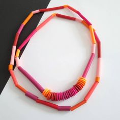 With every order you get a gift. Welcome!🤗 Light and effective geometric necklace.  The necklace can be worn in two ways, once or twice around the neck.  Colors: neon orange, orange, a few shades of pink, magenta...  The beads are on waxed cotton thread.  Necklace length is 120cm. The tube beads are approx. 7mm thick. Very comfortable to wear. Made when ordered. Polymer clay is a relatively new material. For jewelry made of polymer clay, do not act like it's metal or wood jewelry. Clay is durab Pink Handmade Minimalist Necklaces, Pink Handmade Minimalist Necklace, Handmade Minimalist Pink Necklaces, Minimalist Handmade Pink Necklace, Handmade Minimalist Pink Necklace, Modern Orange Necklace As Gift, Modern Orange Necklace For Gift, Unique Orange Long Necklace, Orange Long Beaded Necklace For Gifts