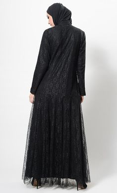 Featuring a beautiful and modest wear flared abaya dress in nida fabric adorned with sheer net self woven fabric layer on the top and button closure detailing at the centre front. It has a comfortable and fully covered high neck mandarin collar and pleated panels at the bottom skirt that looks very elegant perfect to be worn for formal ocassions.FIT : Relaxed fit.COMPOSITION : Nida, net.CARE : Dry clean only. Modest Lace Maxi Dress, Modest Long Sleeve Abaya For Party, Fall Party Abaya With Long Sleeves, Modest Long Sleeve Lace Dress, Modest Long Abaya For Evening, Modest Long Party Abaya, Modest Long Evening Abaya, Long Modest Party Abaya, Modest Wear