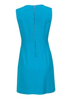 Turquoise is such a unique color -- for a unique person just like you! This simple work dress would make for a great staple piece for your office wardrobe. Pair it with a sensible blazer and pump for that streamlined professional ensemble. Size 8 63% Polyester, 27% Viscose, 7% Cotton, 3% Elastane Exposed gunmetal back zipper Unlined Sheath silhouette Round neckline Sleeveless Bust 32" Waist 30" Shoulder to hem 35" Blue Sleeveless Workwear Dress, Elegant Blue Sheath Sleeveless Dress, Blue Workwear Dress With Back Zipper, Copenhagen Living, Luxury Blue Sheath Mini Dress, Blue Shift Dress With V-neck, Unique Person, Simple Work, Office Wardrobe