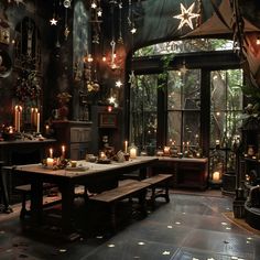 a dining room filled with lots of tables and candles