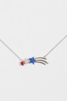 Bring sparkles everywhere you go with our red white and blue shooting star necklace. Made with sapphire, clear, and light siam red crystals. Make these shiny stars your everyday accessory. Perfect for national holidays such as July 4th! Product photos may appear a lot bigger than the actual piece. Please see exact dimensions in the details section. Color may vary slightly due to the color calibration of each individual monitor. * Materials: Rhodium plating over .925 sterling silver with pave cry Shooting Star Necklace, Red White And Blue Stars, Jewelry Summer, Blue Stars, Everyday Accessories, Red Crystals, Shooting Stars, Summer Jewelry, Star Necklace