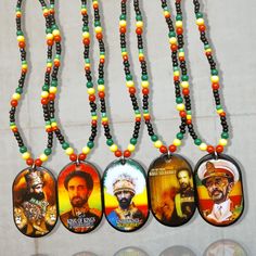 Experience the majesty of Emperor Haile Selassie I through these exquisite beaded necklaces. Each one is a symbol of Rastafarian culture and the deeply held beliefs of its followers. Let these necklaces be a reminder of the powerful message of unity and strength that Emperor Haile Selassie I embodies. Experience the ever-changing beauty of our Beaded Necklaces! Please note that the bead style may vary (but will always be stunning!). Our pendants are made of high-quality acrylic, and the necklace measures 24 inches from end to end. Each pendant is a bold 2 inches high and 1.25 inches wide, with a solid black back for a sleek look. Perfect for gift-giving, these necklaces are sure to impress with their unique and versatile style! ORDERS USUALLY SHIP IN 24 HOURS We Also Have Rasta Earrings... Rasta Jewelry, Emperor Haile Selassie, Rasta Beaded Necklace, Reggae Keychains, Rasta Hoodie, Necklaces Bead, Rastafarian Culture, Rasta Earrings, Haile Selassie