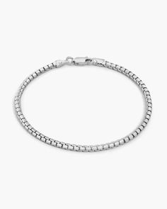 Our highly anticipated men’s silver 2.5mm Round Box Bracelet is crafted in Italy with 925 sterling silver. This men’s bracelet features interlocking square links embellished with rounded edges for a sleek, smooth design. Mens Chain Bracelet, Silver Chain For Men, S Bracelet, Solid Gold Chains, Round Box, Silver Coat, Silver Chain Bracelet, Silver Shop, Men's Rings