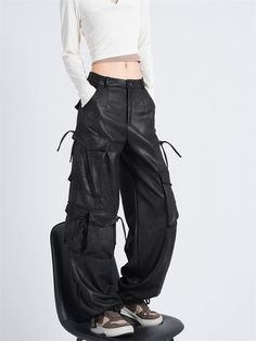 Features: Get a hint of vintage streetwear with our Black Gothic Baggy Cargo Pants. These pants, with a wide leg and an emo aesthetic, are perfect for a 90s-inspired look. Stay stylish and comfortable with this unique blend of fashion and function. Edgy Baggy Straight Leg Cargo Pants, Baggy Straight Leg Edgy Cargo Pants, Baggy Edgy Pants With Cargo Pockets, Edgy Fall Cargo Pants, Edgy Wide-leg Cargo Pants, Edgy Cargo Pants For Fall, Grunge Wide Leg Bottoms For Alternative Fashion, Black Cargo-style Grunge Bottoms, Edgy Wide Leg Cargo Pants