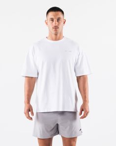 HIGHLIGHTS Crew neckline style Oversized fit with drop shoulder Alphalete Wolf Head logo on the back Sweat-wicking, breathable material Smooth and flexible fabric FIT SUGGESTION. This item runs true to Alphalete’s oversized. fit.. If you are between sizes, we recommend sizing up. Model is 6’0”/183cm, wearing a size L with a 43.5”/110.5cm chest.. MATERIALS AND WASHING DIRECTIONS 94% Cotton and 6% Spandex. We recommend washing inside-out on a cold setting. Hang to dry Anticipated shrinkage will oc Wolf Head Logo, Success Message, Money Sign, Wolf Head, Hip Hip, B Cup, Ombre Effect, Oversized Fits, Drop Shoulder