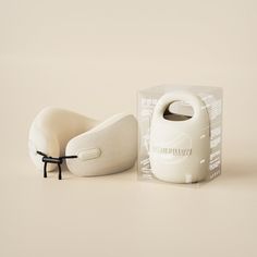 an inflatable pillow sitting next to a box