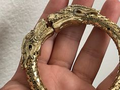 "Richard A Serbin gold plated double dragon bracelet, cuff bracelet    marked: R. Serbin  approximately 6 7/8\" - 7\" easy to open Very good condition  09/20/23 1593" Gold Jewelry With Dragon Design, Luxury Gold Jewelry With Dragon Design, Dragon Jewelry Bracelets, Gold Dragon Bracelet, Golden Dragon Necklace, Double Dragon, Enchanted Jewelry, Dragon Bracelet, Gold Dragon