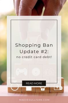 someone holding up a card with the text shopping ban update 2 no credit card debt