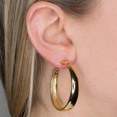 Product Description: Lightweight, gold-plated hoop earrings are a jewelry box staple! As seen on Adwoa Aboah and Chrissy Teigan.  Dimensions: 1.75" x 1.75" ﻿Style Number: ﻿4390EPG Adwoa Aboah, Clip Earrings, Kenneth Jay Lane, Gold Hoops, Gold Hoop Earrings, Clip On Earrings, Ear Cuff, Gold Earrings, Jay