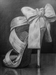 a pencil drawing of a high heeled shoe with a bow on the front and side