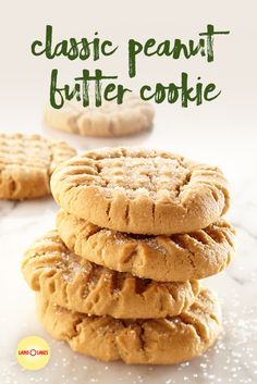 a stack of peanut butter cookies with the words classic peanut butter cookie in front of it