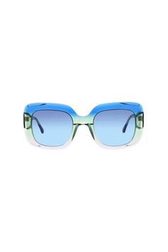 Translucent blue, green, and peach frames feature wide sides and matching blue lenses for bright summer style. Made in lightweight acetate, these blue fashion sunglasses are the perfect accessory for your warm-weather wardrobe, from the beach to the city. Oversized rectangular frames in translucent blue and green acetate Blue gradient lenses CR lenses offer 100% UVA/UVB protection Custom Italian and Japanese acetates European hinges Includes exclusive Trina Turk printed soft sunglass case European Hinges, Blue Gradient, Blue Lenses, Sunglasses & Glasses, Trina Turk, Blue And Green, Fashion Sunglasses, Blue Fashion, Summer Style