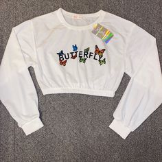 Romwe Butterfly Elastic Hem Sweatshirt. In A Size Small. Slight Stretch And Cropped. In Perfect Condition. White Long Sleeve Crop Top With Graphic Print, Summer Long Sleeve Crop Top With Letter Print, White Stretch Sweatshirt With Letter Print, White Cotton Crop Top For Fall, White Long Sleeve Crop Top For Spring, White Crew Neck Crop Top With Letter Print, White Crew Neck Crop Top For Spring, Long Sleeve Top With Letter Print For Spring, White Long Sleeve Casual Top