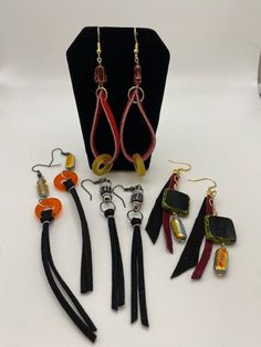 Fun, free-flowing, boho earrings. Handmade with dyed leather, wire, and sea glass ring Adjustable Bohemian Wrap Earrings For Party, Leather Dangle Jewelry For Party, Party Leather Dangle Jewelry, Sea Glass Ring, Fabric Earrings, Glass Ring, Glass Rings, Free Flowing, Boho Earrings