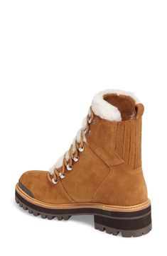 Plush shearling trim lends cold-weather appeal to a trend-right, lace-up boot set atop a lugged sole for traction on wet or dry surfaces. 1 1/2" heel; 1" platform (size 8.5) 7" shaft Lace-up style Cushioned insole Leather and genuine shearling (China) upper/synthetic lining and sole Imported Women's Shoes Brown Winter Lace-up Boots With Suede Lining, Brown Lace-up Boots With Suede Lining For Winter, Shearling Lace-up Winter Boots, Leather Lace-up Boots For Cold Weather In Fall, Winter Lace-up Boots With Suede Lining, Leather Lace-up Boots For Cold Weather And Fall, Winter Lace-up Shearling Boots With Round Toe, Classy Editorial, Editorial Collage