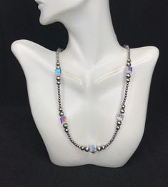 This is a high quality handmade Navajo Pearl silver bead necklace with Crystal. The silver beads are 3,5,6mm and the Crystal are 8mm. Necklace measures 18" long.  Necklace is handmade in USA and of Southwest origin. Thanks for looking and check out more items in my Etsy shop for more great items and deals! https://www.etsy.com/shop/925usa Payment: We accept all major credit cards through direct check out and Paypal. New Mexico residents have to pay sales tax. Payments must be made within 3 days Spiritual Silver Beaded Necklaces With Faceted Beads, Silver Necklaces With Spacer And Round Beads, Silver Single Strand Custom Necklace As Gift, Silver Single Strand Beaded Necklace As Gift, Silver Necklaces With 8mm Beads For Jewelry Making, Sterling Silver Beaded Necklace With Spacer Beads, Silver Necklaces With 8mm Sterling Silver Beads, Silver Beaded Necklace With Spacer And Oval Beads, Silver Beaded Necklaces With Faceted Beads