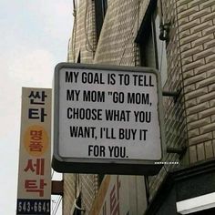 a sign that says, my goal is to tell my mom'go mom, choose what you want, i'll buy it for you