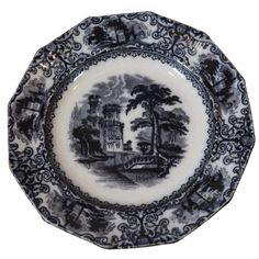 a black and white plate with a castle on it