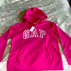 Nwt Hoodie By The Gap Color Is A Deep Pink Size Xs Or A Kids L-Xl Measurements Are: Chest 19in Across & 23in Length This Would Make A Lovely Gift!! Thanks For Looking Gap Hooded Tops For Fall, Gap Tops With Drawstring Hood For Fall, Sporty Gap Sweatshirt For Spring, Sporty Gap Tops For Winter, Gap Hoodie With Letter Print For Fall, Sporty Gap Hoodie For Spring, Gap Tops With Letter Print For Winter, Gap Letter Print Tops For Winter, Gap Hooded Sweatshirt For Spring