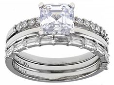 Bella Luce® white diamond simulant 3.45ctw square asscher cut, round, and baguette, platinum over sterling silver ring set of 3. Measures approximately 0.81"L x 0.25"W and is not sizable. The diamond equivalent weight is 2.09ctw. Silver Asscher Cut Ring With Channel Set, Classic Stackable Baguette Cut Cubic Zirconia Rings, Classic Emerald Cut Cubic Zirconia Stackable Rings, Asscher Cut Ring, Sterling Silver Rings Set, Silver Ring Set, Man Made Diamonds, Diamond Simulant, Asscher Cut