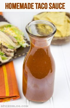 homemade taco sauce in a small glass bottle