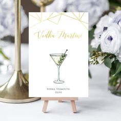 a card with an image of a cocktail on it