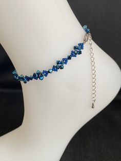 Crystal, Crystal ankle bracelet, chic, body jewelry, crystal metallic blue 2x, luxury, fashion A very modern and little seen metallic color.  Width: 0.5 cm Length: 22 cm + 5 cm chain You can also tell me the length you want to adapt it to your ankle.  Material: crystal, silver stainless steel primers without nickel Crystal is glass with a refractive index of 1.545 or higher. Unlike glass, crystal has more clarity, more brightness. Adjustable Crystal Anklets In Elegant Style, Blue Crystal Bracelet For Party, Elegant Crystal Anklets With Adjustable Fit, Blue Crystal Bracelet With Rhinestones For Party, Blue Rhinestone Crystal Bracelet For Party, Adjustable Blue Anklets For Party, Blue Beaded Anklets For Party, Jewelry Crystal, Foot Jewelry