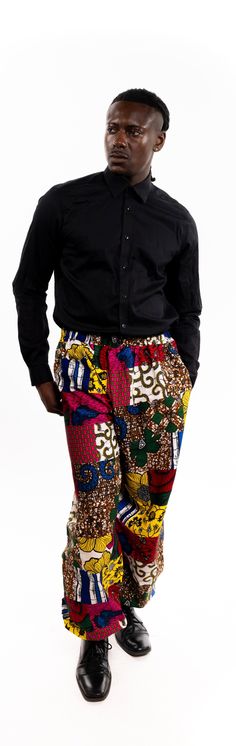 PRODUCT DETAILS: Designed in the U.S., hand-crafted in Africa Delivery within 2 weeks Multiple prints available These medium-rise African print pants are designed with African fabric. They feature a fitted design to embrace your silhouette with comfortable material. The straight-legged pants sit securely below the waist and are tight at the ankles for a stylish look. Look for the perfect color to match your next event and show off a casual finesse. Can be worn as evening wear to various events s Multicolor Printed Cotton Pants, Multicolor Printed Cotton Bottoms, Patterned Printed Straight Pants, Multicolor Stretch Straight Leg Pants, Multicolor Printed Straight Leg Pants, Multicolor Long Pants With Elastic Waistband, Casual Multicolor Bottoms With Abstract Print, Casual Multicolor Abstract Print Bottoms, Patterned Cotton Trousers