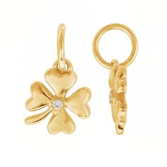 This 14-karat yellow gold four-leaf clover charm is set with one .005-ct. round white diamond (SI-I1 grade/G,H,I color; .005-ct. TW) in the center of the clover. The charm is flat on the back and brightly finished on both sides. String it on a chain, connect it to bracelet, attach an ear wire, or use it as a jewelry tag or accent in a larger design. Four Leaf Clover Jewelry, Medallion Jewelry, Four Leaf Clover Charm, Clover Jewelry, Clover Design, Clover Charm, Jewelry Tags, Jewellery Brand, Four Leaves