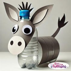 an animal made out of plastic water bottles